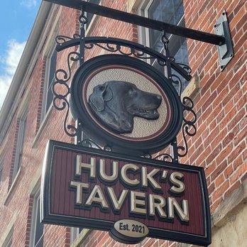 Hucks Tavern - a dog's head on the sign - Hot Dogs Near Me - Coshocton, Ohio Hucks Tavern - a dog's head on the sign - Hot Dogs Near Me - Coshocton, Ohio