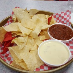 CJ's Sports Bar & Grill - Queso,  Chips with $1. 00 added salsa. $ 2.99 chip refill and they were stale (sent back and was told they all are like that) sad  no care