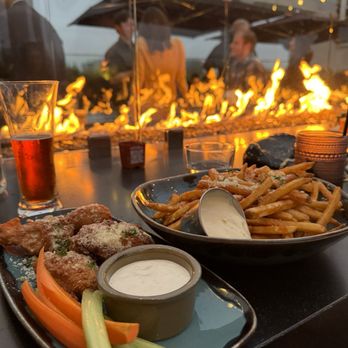 Flora Rooftop Bar - Garlic Parmesan wings and French fries - Lounges Near Me - El Segundo, California