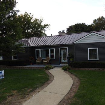 A & B Exteriors LLC - a house with a metal roof - Roofing Near Me - Sandwich, Illinois A & B Exteriors LLC - a house with a metal roof - Roofing Near Me - Sandwich, Illinois