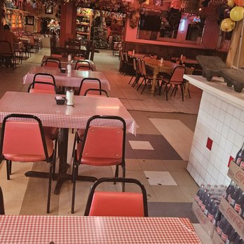 Laredo Taqueria - tables and chairs in a restaurant - Mexican Near Me - Houston, Texas Laredo Taqueria - tables and chairs in a restaurant - Mexican Near Me - Houston, Texas