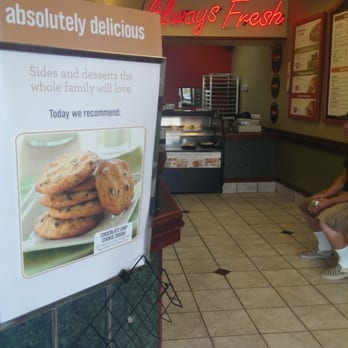 Papa Murphy's - a man sitting in front of a sign - Pizza Near Me - Lakewood, Colorado Papa Murphy's - a man sitting in front of a sign - Pizza Near Me - Lakewood, Colorado
