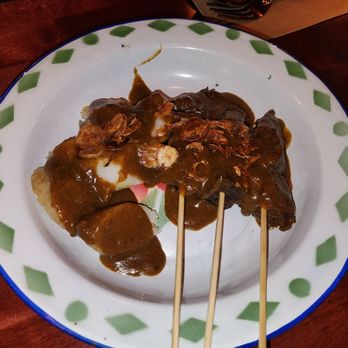 Pasar - Sate Padang: flank steak skewers with curry gravy and lontong rice cakes - Indonesian Near Me - Portland, Oregon