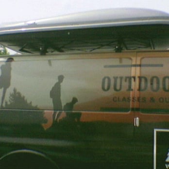 REI - REI Adventure Van with Thule Evolution 1800 Cargo Box on Roof Rack - Bikes Near Me - Berkeley, California