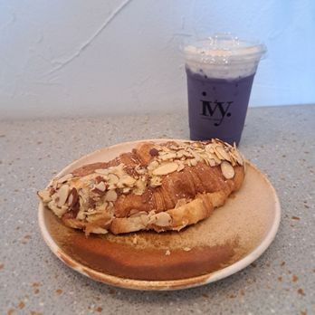 ivy. Coffee Shop - Ube Latte Cold Foam with Almond Croissant - Coffee & Tea Near Me - Toronto, Ontario
