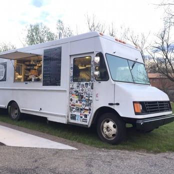 Vehicle City Tacos - a food truck parked on the side of the road - Food Trucks Near Me - Flint, Michigan Vehicle City Tacos - a food truck parked on the side of the road - Food Trucks Near Me - Flint, Michigan
