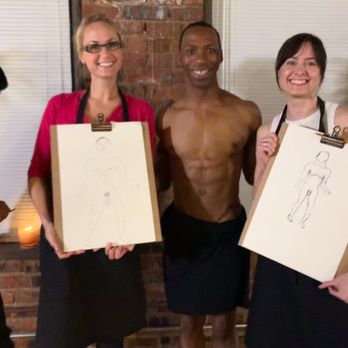 The Artful Bachelorette - three men and a woman holding their drawings - Art Classes Near Me