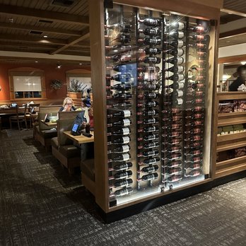 Olive Garden Italian Restaurant - Walking in the front door is their large case of wine. - Italian Near Me - St. George, Utah Olive Garden Italian Restaurant - Walking in the front door is their large case of wine. - Italian Near Me - St. George, Utah