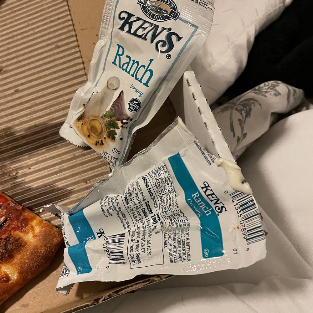 a slice of pizza and chips
