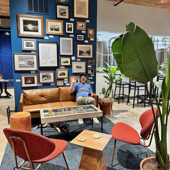 Paddlefish Brewing - a man relaxing in a lounge area - Breweries Near Me - Saint Peter, Minnesota Paddlefish Brewing - a man relaxing in a lounge area - Breweries Near Me - Saint Peter, Minnesota