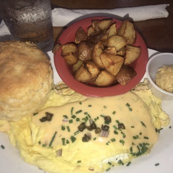 Ruby Slipper Marigny - Salmon omelette . FYI the picture does the biscuit no justice . The biscuits are HUGE. - Breakfast & Brunch Near Me - New Orleans, Louisiana Ruby Slipper Marigny - Salmon omelette . FYI the picture does the biscuit no justice . The biscuits are HUGE. - Breakfast & Brunch Near Me - New Orleans, Louisiana
