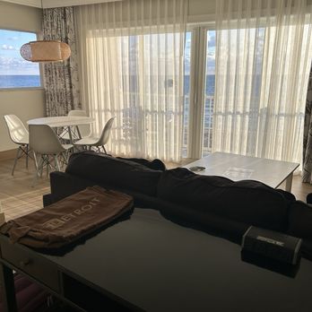 Sun Tower Hotels and Suites - Desk, living room, corner room w balcony, huge doorwall and another north facing window to enjoy the beautiful views! - Hotels Near Me - Fort Lauderdale, Florida Sun Tower Hotels and Suites - Desk, living room, corner room w balcony, huge doorwall and another north facing window to enjoy the beautiful views! - Hotels Near Me - Fort Lauderdale, Florida