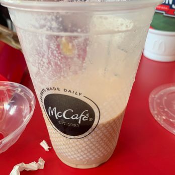McDonald's - a plastic cup of coffee on a red table - Fast Food Near Me - Boston, Massachusetts McDonald's - a plastic cup of coffee on a red table - Fast Food Near Me - Boston, Massachusetts