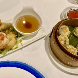 Malacca Restaurant - Starters: tempura vegetables with dipping sauce £9.50 and steamed Siu Mai dumplings with pork £9