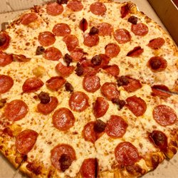 King kong NY Pizza - Pepperoni & Sausage Pizza (Large, ~$22)- 4-4.5/5 stars. Their deal included a 2 liter soda.