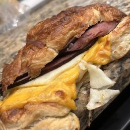 Croissant Breakfast Sandwich with egg whites, ham, and cheddar cheese