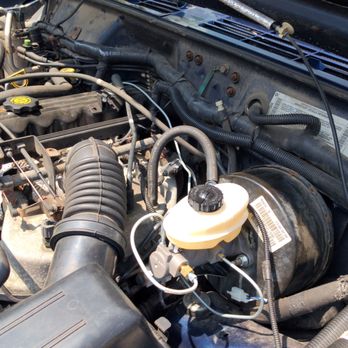 Hunter's Auto Service - Image showing the brake line running over the valve cover - Auto Repair Near Me - Delavan, Wisconsin