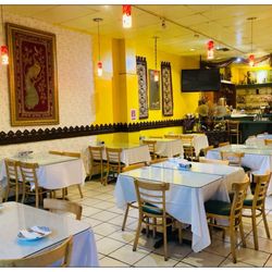 Salathai Thai Cuisine - Indoor vibe. Tables are neat and spacious.