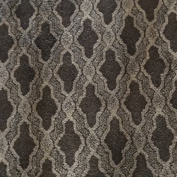 Decor Sams Construction - a closeup of a carpet - Flooring Near Me