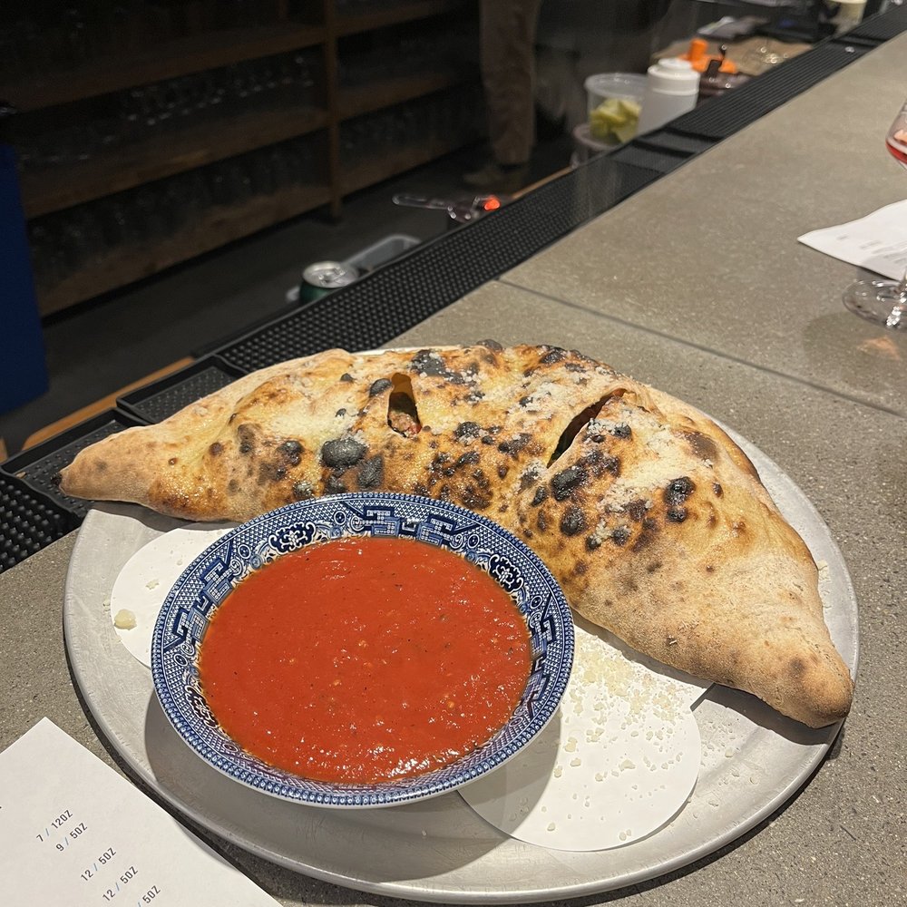 The Sausage and Onion Calzone The Sausage and Onion Calzone