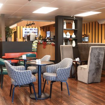 Rakiscafe - a view of a restaurant with tables and chairs - Breakfast & Brunch Near Me - falls church, Virginia