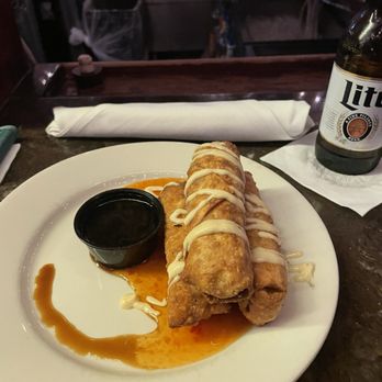 Half Shell - Crispy shrimp egg rolls, shrimp, carrots, cabbage, creole seasoning-- Booooom - Seafood Near Me - Memphis, Tennessee Half Shell - Crispy shrimp egg rolls, shrimp, carrots, cabbage, creole seasoning-- Booooom - Seafood Near Me - Memphis, Tennessee