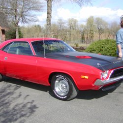 Viper red Challenger with black out hood restoration at NAMC!