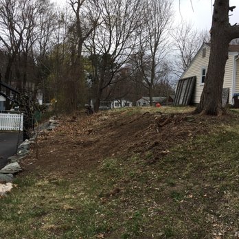 Rodenhiser - Side shot before Bill built a wall and leveled the area - General Contractors Near Me - Holliston, Massachusetts
