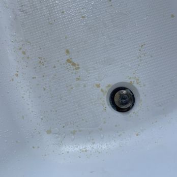 White Tub Refinishing - Before pic with oil and salt embedded stains - Refinishing Services Near Me White Tub Refinishing - Before pic with oil and salt embedded stains - Refinishing Services Near Me