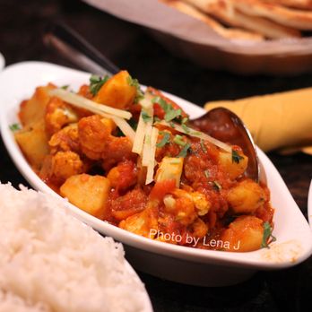 Cardamom - Aloo Gobi ($15) - Potatoes + cauliflower, tomato-based curry sauce - Indian Near Me - Ann Arbor, Michigan Cardamom - Aloo Gobi ($15) - Potatoes + cauliflower, tomato-based curry sauce - Indian Near Me - Ann Arbor, Michigan