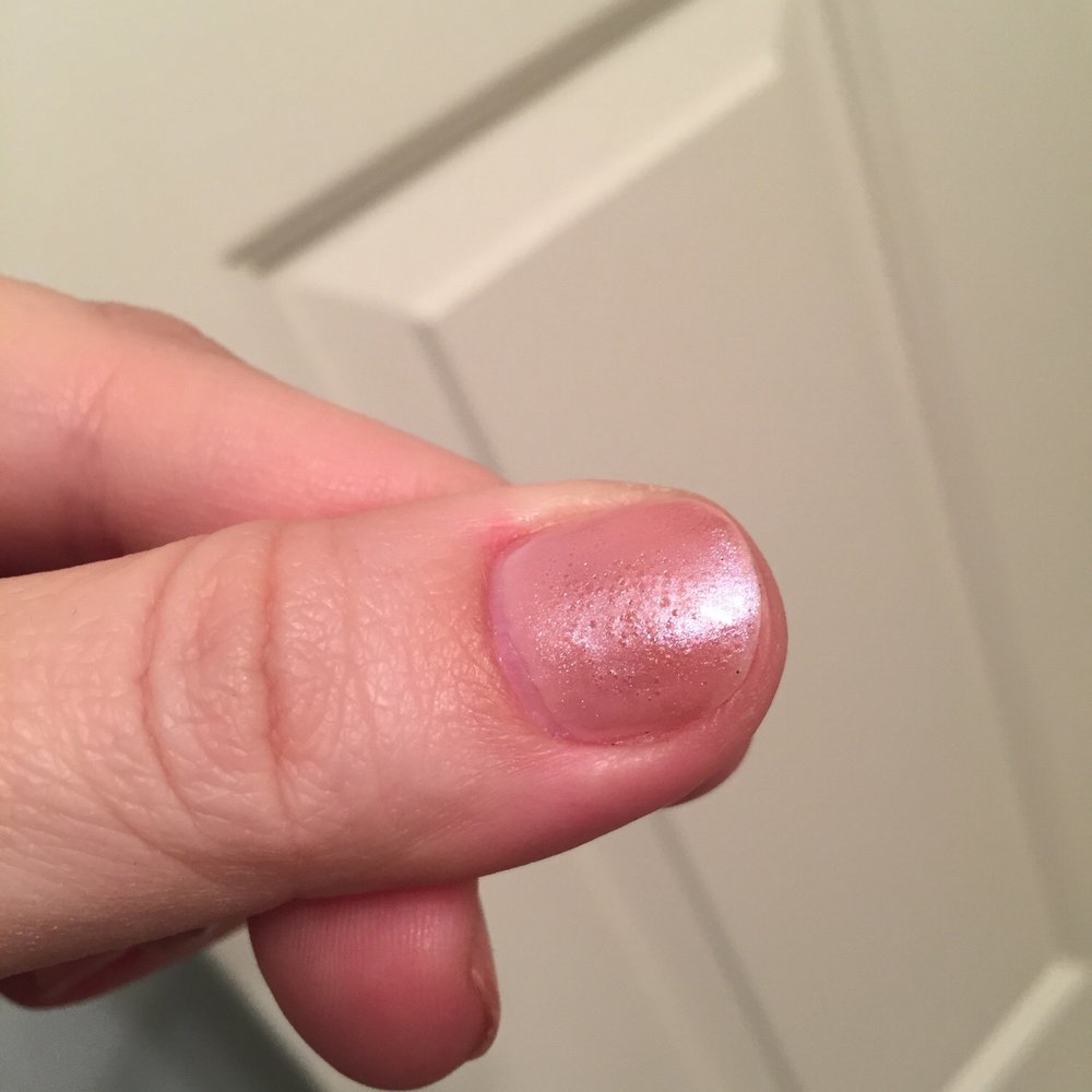 Pitted holes or bubbles in nail polish... Don't know what causes that but it's on almost all of the fingers. Pitted holes or bubbles in nail polish... Don't know what causes that but it's on almost all of the fingers.