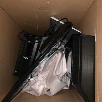 Hollister Moving & Storage - This is how they packed a computer (monitor in sideways w/o ample packing material - Movers Near Me - Salinas, California