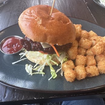 Tavern in the Square - Fried chicken sandwich with tater tots - New American Near Me - Wrentham, Massachusetts Tavern in the Square - Fried chicken sandwich with tater tots - New American Near Me - Wrentham, Massachusetts
