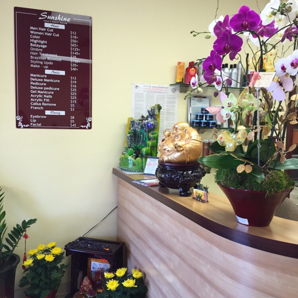 Sunshine Salon - Pretty real orchids at the Front desk - Hair Salons Near Me - Carson, California Sunshine Salon - Pretty real orchids at the Front desk - Hair Salons Near Me - Carson, California