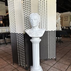 Pallas Athena Greek Kouzina - Head statue that greets you upon entry.