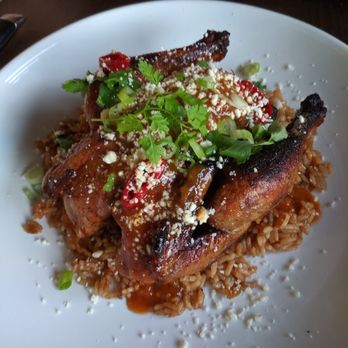 Ford + Shep - Entree: chicken with stuffing over spanish rice - Cocktail Bars Near Me - Greenville, North Carolina Ford + Shep - Entree: chicken with stuffing over spanish rice - Cocktail Bars Near Me - Greenville, North Carolina