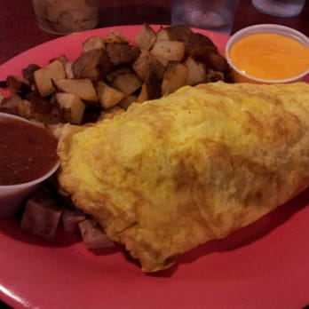 Squeeze In - Dirty Dick omelette with tomato pesto and cheddar cheese sauce, no gluten - Breakfast & Brunch Near Me - Truckee, California Squeeze In - Dirty Dick omelette with tomato pesto and cheddar cheese sauce, no gluten - Breakfast & Brunch Near Me - Truckee, California