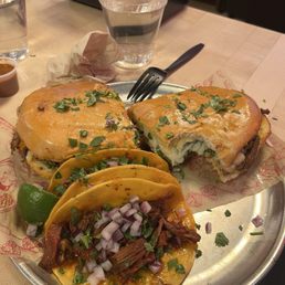 Torta, 2 Tacos (birria de chivo) & Consomé Torta, 2 Tacos (birria de chivo) & Consomé