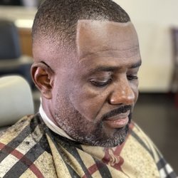 Anointed Hands Barbershop - Bastrop - Mid fade faded beard