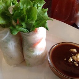 a plate of food with dipping sauce a plate of food with dipping sauce
