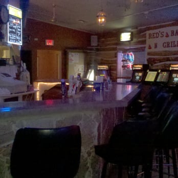 Red's Pub & Grill - a bar with black chairs - Pubs Near Me - Algoma, Wisconsin Red's Pub & Grill - a bar with black chairs - Pubs Near Me - Algoma, Wisconsin