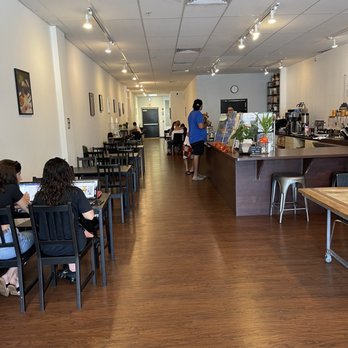 Vespr Coffeebar - people sitting at tables in a coffee shop - Coffee & Tea Near Me - Orlando, Florida