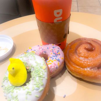 Dunkin' - Caramel Latte, Cinnamon Roll , Peeps Donut, and strawberry bliss! How do you take it? Come on over let's coffee and donut!! - Donuts Near Me - Las Vegas, Nevada