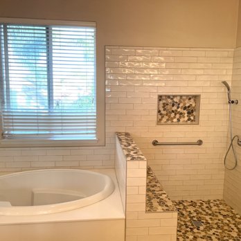 RK Construction - Before glass shows how tub was incorporated into the job. - General Contractors Near Me