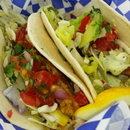 Street taco with Peruvian sauce on the left and key west taco. $4 each but you might want to buy at least 2 for complete meal. Street taco with Peruvian sauce on the left and key west taco. $4 each but you might want to buy at least 2 for complete meal.