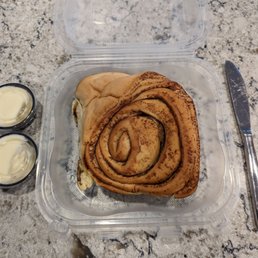 GIANT cinnamon roll (with frosting thoughtfully packaged separately for to-go orders)
