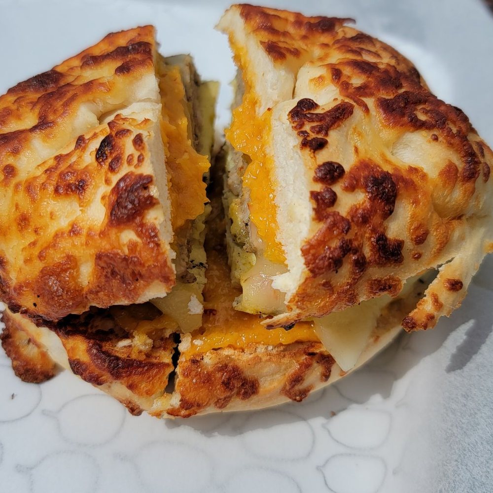 Undergrounds Coffee House and Roastery - The Colonel Francisco on toasted asiago bagel: Enjoyed this bagel flavor, something I don't get very often - Coffee Roasteries Near Me - Buffalo, New York