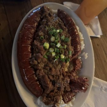 Coop's Place - Dirty Rice & Beans w/ a big'ole Sausage. Wife enjoys big Sausages! - Cajun/Creole Near Me - New Orleans, Louisiana Coop's Place - Dirty Rice & Beans w/ a big'ole Sausage. Wife enjoys big Sausages! - Cajun/Creole Near Me - New Orleans, Louisiana