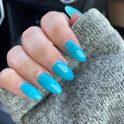 Deluxe Nail Salon & Spa - Turquoise almond shaped nails