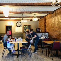 Mel's Place - Renovated interior...minimalist and spotless. Love the hundred year old exposed brick.